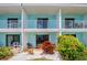 Ground level patio access with tropical landscaping at 2850 Ocean Shore Blvd # 15C, Ormond Beach, FL 32176