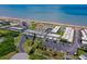 Aerial view of oceanfront condos with parking and a pool at 2850 Ocean Shore Blvd # 15C, Ormond Beach, FL 32176