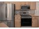 Stainless steel range, microwave, and refrigerator at 1204 Casterton Cir, Davenport, FL 33897