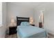 Bedroom with en-suite bathroom and tile floors at 12245 Park Ave, Windermere, FL 34786