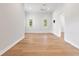 Well lit bedroom with hardwood floors and multiple windows at 12245 Park Ave, Windermere, FL 34786