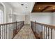 Upper hallway with tile floors and wood ceiling at 12245 Park Ave, Windermere, FL 34786