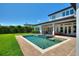 Luxury pool and spa with backyard access and patio at 12245 Park Ave, Windermere, FL 34786