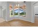 Bright breakfast nook with hardwood floors and views of the pool at 12245 Park Ave, Windermere, FL 34786