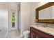 Small bathroom with granite countertop and walk in shower at 12245 Park Ave, Windermere, FL 34786