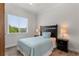 Bedroom with window and tile floors at 12245 Park Ave, Windermere, FL 34786