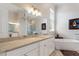 Bright bathroom featuring a double vanity and a free-standing bathtub at 12245 Park Ave, Windermere, FL 34786