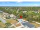 Aerial view of a neighborhood, arrow indicating a specific property at 3186 Newhope Dr, Deltona, FL 32738