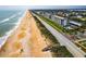 Aerial view of beachfront property with beach access at 3170 Ocean Shore Blvd # 305, Ormond Beach, FL 32176