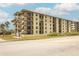 Seabridge North condo building, featuring multiple floors and balconies at 3170 Ocean Shore Blvd # 305, Ormond Beach, FL 32176