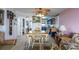 Bright dining area with a table and chairs, offering a view of the ocean at 3170 Ocean Shore Blvd # 305, Ormond Beach, FL 32176