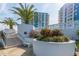 White staircase with landscaping and building view at 935 N Halifax Ave # 907, Daytona Beach, FL 32118