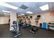 Well-equipped fitness center with treadmills, ellipticals, and weight machines at 935 N Halifax Ave # 907, Daytona Beach, FL 32118