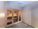 Relax in this clean and modern sauna, featuring glass doors and light wood at 935 N Halifax Ave # 907, Daytona Beach, FL 32118