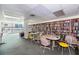 Community library with ample seating and bookshelves at 935 N Halifax Ave # 907, Daytona Beach, FL 32118