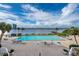 Relaxing pool area with ample lounge chairs and stunning water views at 935 N Halifax Ave # 907, Daytona Beach, FL 32118