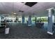 Spacious community room with multiple tables and chairs, great for gatherings at 935 N Halifax Ave # 907, Daytona Beach, FL 32118
