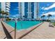 Inviting pool with surrounding patio at 935 N Halifax Ave # 907, Daytona Beach, FL 32118