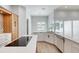 Modern kitchen with large island and white quartz countertops at 260 Spreading Oak Ln, Ormond Beach, FL 32174