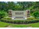 Oak Leaf Preserve community entrance with a stone fountain at 1743 Red Rock Rd, New Smyrna Beach, FL 32168