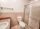 Updated bathroom with a walk-in shower and mosaic countertop at 1119 Indigo Rd, Ormond Beach, FL 32174