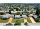 Aerial view of the home and surrounding neighborhood at 10 Juniper Dr, Ormond Beach, FL 32176