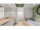 Spa-like bathroom with soaking tub, double vanity, and separate shower at 231 Riverside Dr # 1904, Daytona Beach, FL 32117