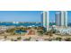 Aerial view of waterfront highrise condos with landscaped entry at 231 Riverside Dr # 1904, Daytona Beach, FL 32117
