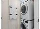 Shared laundry room with stackable washer/dryer at 231 Riverside Dr # 1904, Daytona Beach, FL 32117