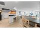 Open concept dining area with kitchen and living area views at 231 Riverside Dr # 1904, Daytona Beach, FL 32117