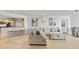 Open concept living room with hardwood floors and modern decor at 231 Riverside Dr # 1904, Daytona Beach, FL 32117