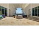 Outdoor patio area with seating overlooking the water at 231 Riverside Dr # 1904, Daytona Beach, FL 32117