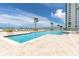 Resort-style pool with plenty of lounge chairs and water views at 231 Riverside Dr # 1904, Daytona Beach, FL 32117