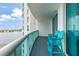 Balcony with two chairs and scenic water views at 231 Riverside Dr # 1904, Daytona Beach, FL 32117