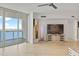 Living room features hardwood floors, sliding glass doors to balcony, and water views at 231 Riverside Dr # 1904, Daytona Beach, FL 32117