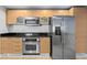 Modern kitchen with stainless steel appliances and granite countertops at 231 Riverside Dr # 1904, Daytona Beach, FL 32117