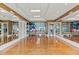 Bright studio with hardwood floors, mirrors, and exercise balls at 231 Riverside Dr # 1904, Daytona Beach, FL 32117