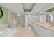 Large bathroom with double vanity, soaking tub, and shower at 231 Riverside Dr # 1904, Daytona Beach, FL 32117