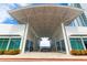 Covered outdoor patio with seating and water views at 231 Riverside Dr # 1904, Daytona Beach, FL 32117