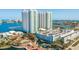 Aerial view of highrise building, parking garage, and waterfront at 231 Riverside Dr # 1904, Daytona Beach, FL 32117