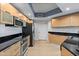 Sleek kitchen featuring stainless steel appliances and granite counters at 231 Riverside Dr # 1904, Daytona Beach, FL 32117