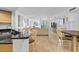 Open concept living room with hardwood floors and modern furniture at 231 Riverside Dr # 1904, Daytona Beach, FL 32117