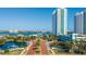 Aerial view of waterfront highrise condos with landscaped entry at 231 Riverside Dr # 1904, Daytona Beach, FL 32117