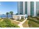 Complex with a pool and walkways near the waterfront at 231 Riverside Dr # 1904, Daytona Beach, FL 32117