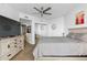 Spacious bedroom with king-size bed and large TV at 231 Riverside Dr # 1904, Daytona Beach, FL 32117