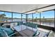 Screened porch with table and chairs, overlooking the river at 235 Coquina Ave, Ormond Beach, FL 32174