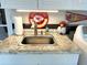 Laundry room features a utility sink, washer, and dryer at 64 Ocean Palm S Dr # 64, Flagler Beach, FL 32136