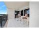Balcony with two chairs and ocean view at 1513 Ocean Shore Blvd # 6C, Ormond Beach, FL 32176