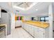 Open kitchen with wood countertops and stainless steel appliances at 1513 Ocean Shore Blvd # 6C, Ormond Beach, FL 32176