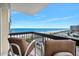 Ocean view balcony with two comfortable chairs at 1513 Ocean Shore Blvd # 6C, Ormond Beach, FL 32176